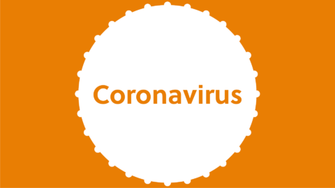 Orange bakgrund med en vit cirkel där det står coronavirus